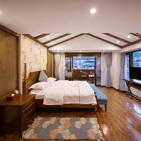 Fenghuang Slowly Time Inn Экстерьер фото