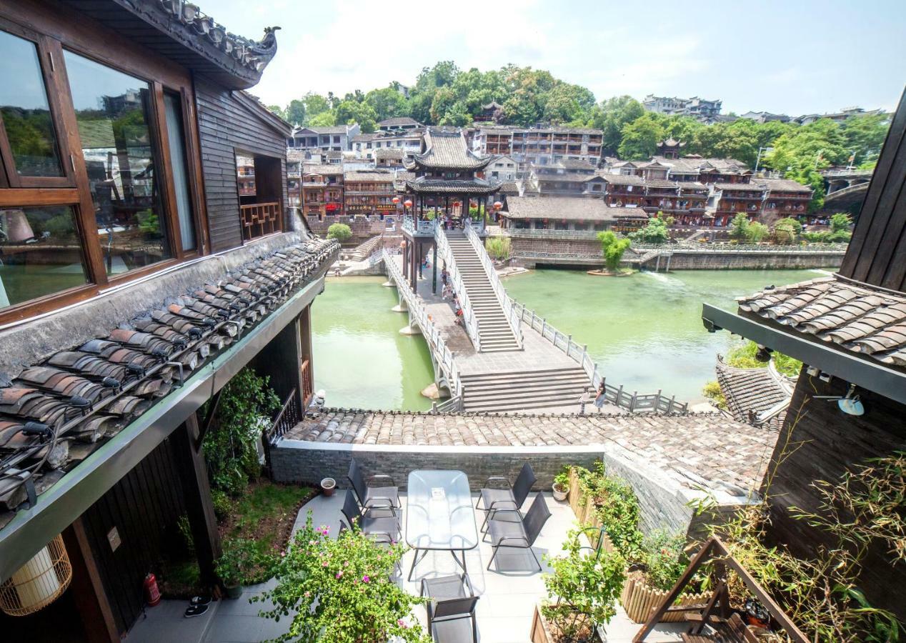 Fenghuang Slowly Time Inn Экстерьер фото