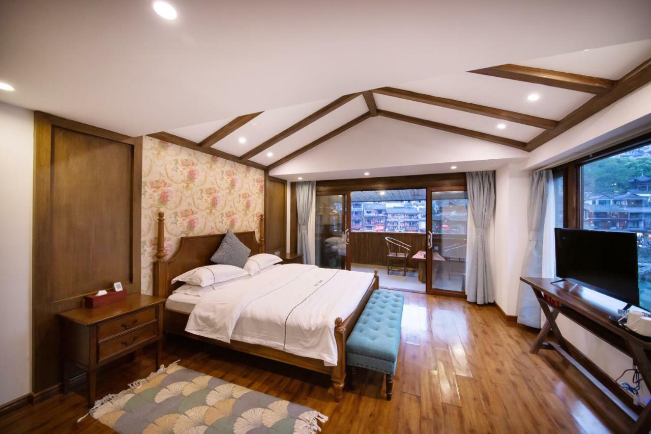 Fenghuang Slowly Time Inn Экстерьер фото