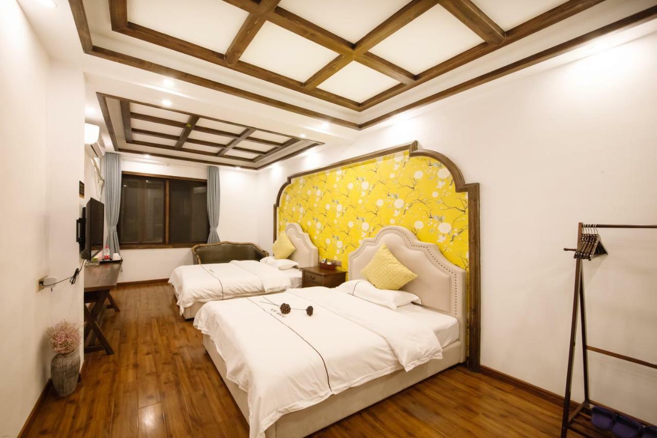 Fenghuang Slowly Time Inn Экстерьер фото