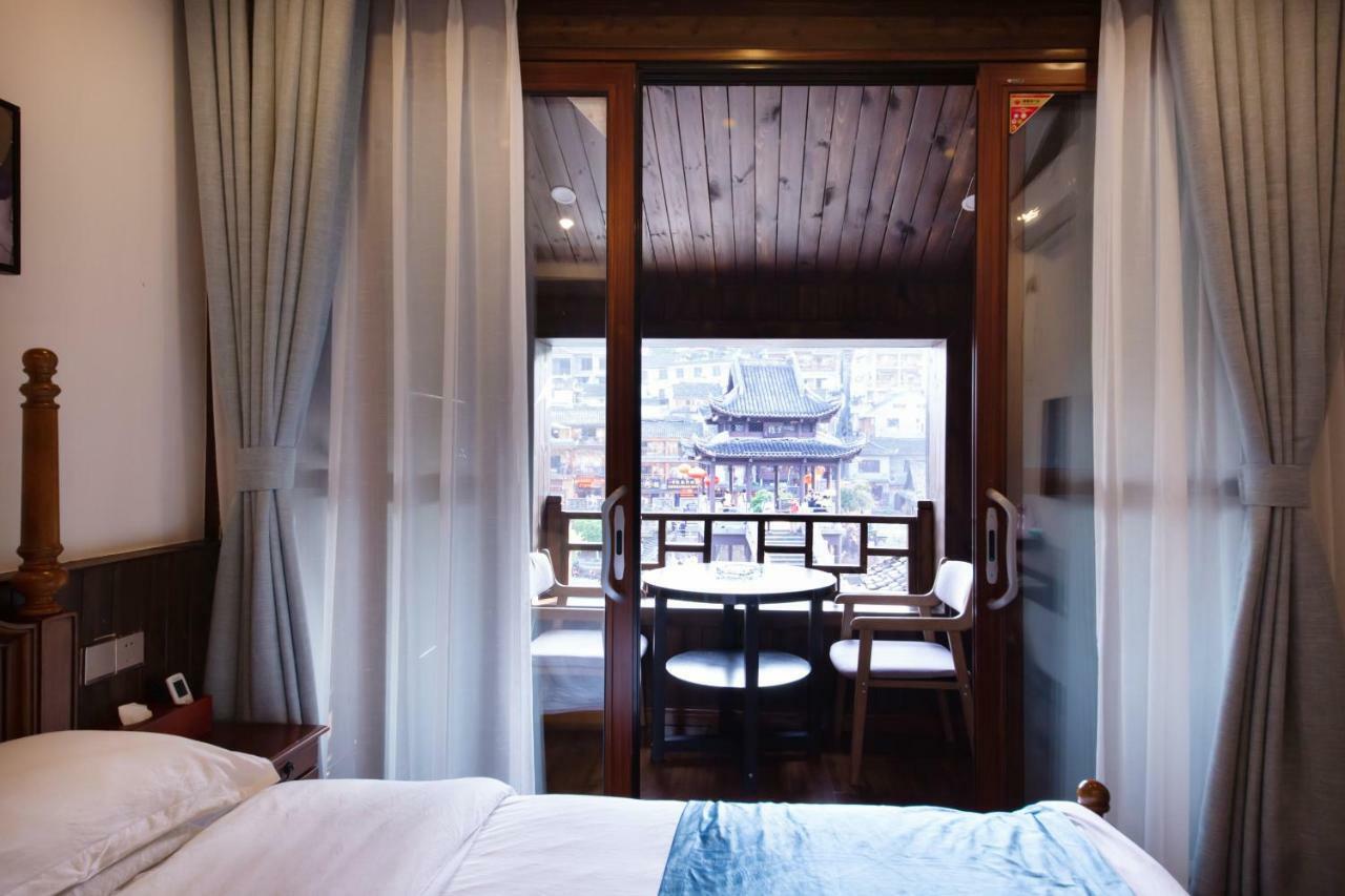Fenghuang Slowly Time Inn Экстерьер фото