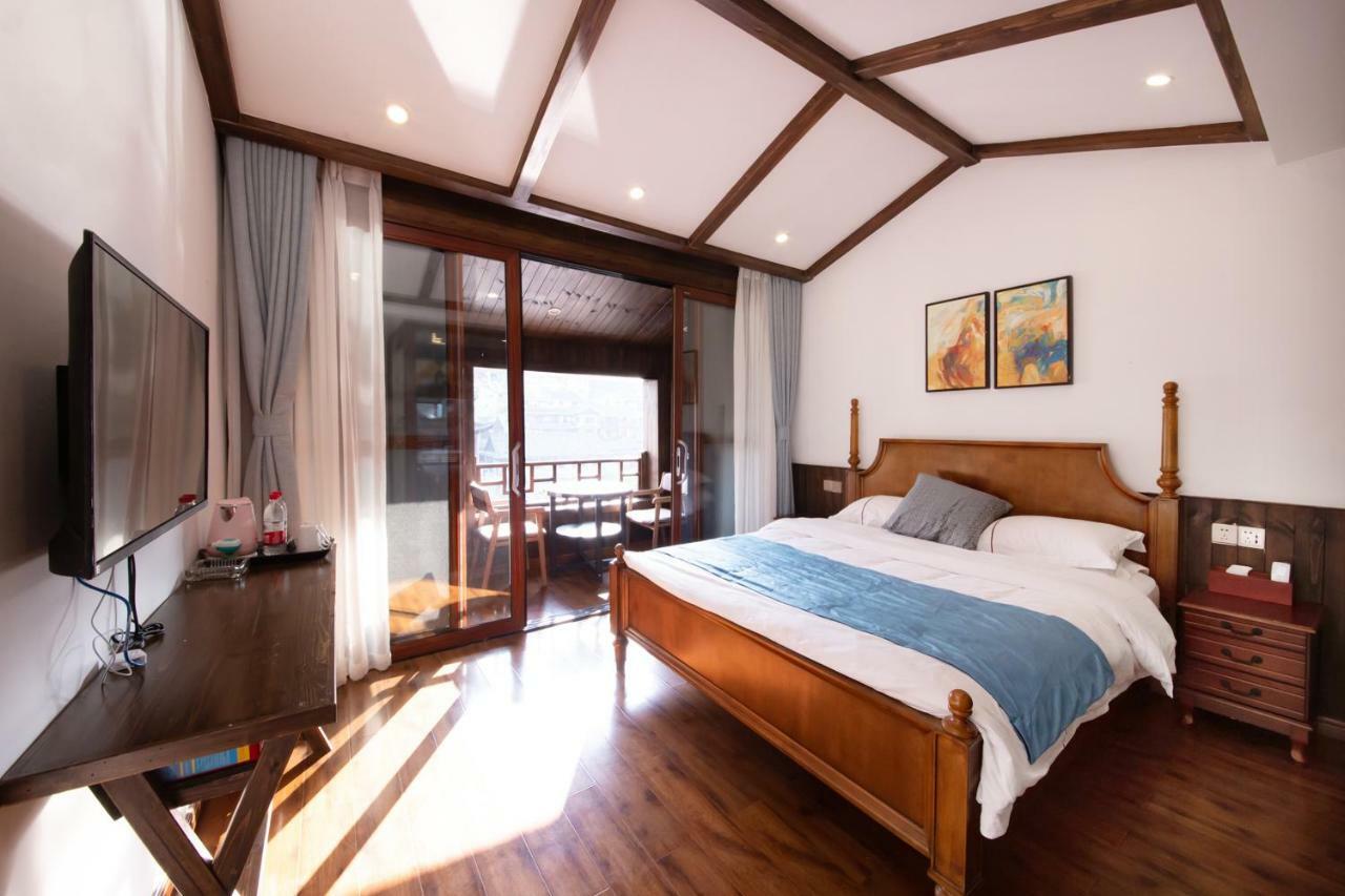 Fenghuang Slowly Time Inn Экстерьер фото