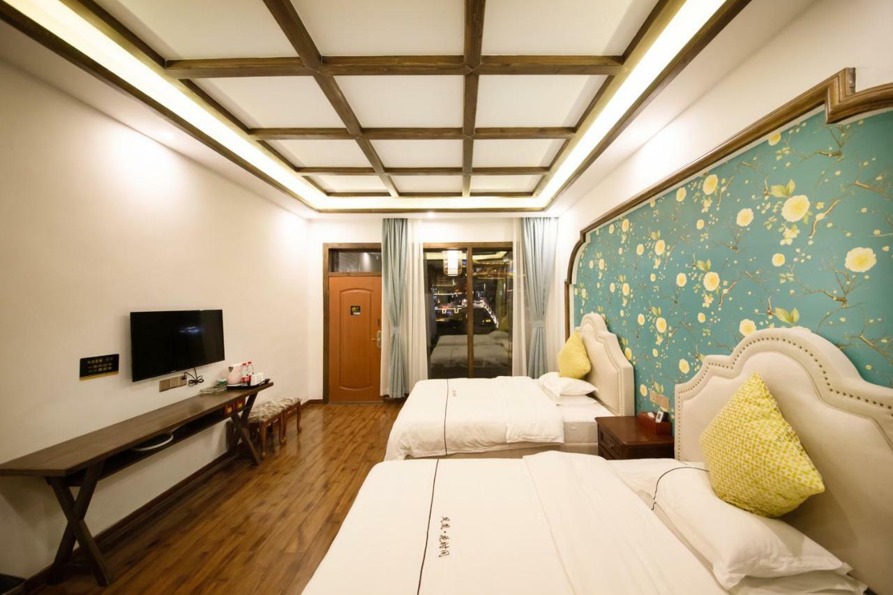 Fenghuang Slowly Time Inn Экстерьер фото